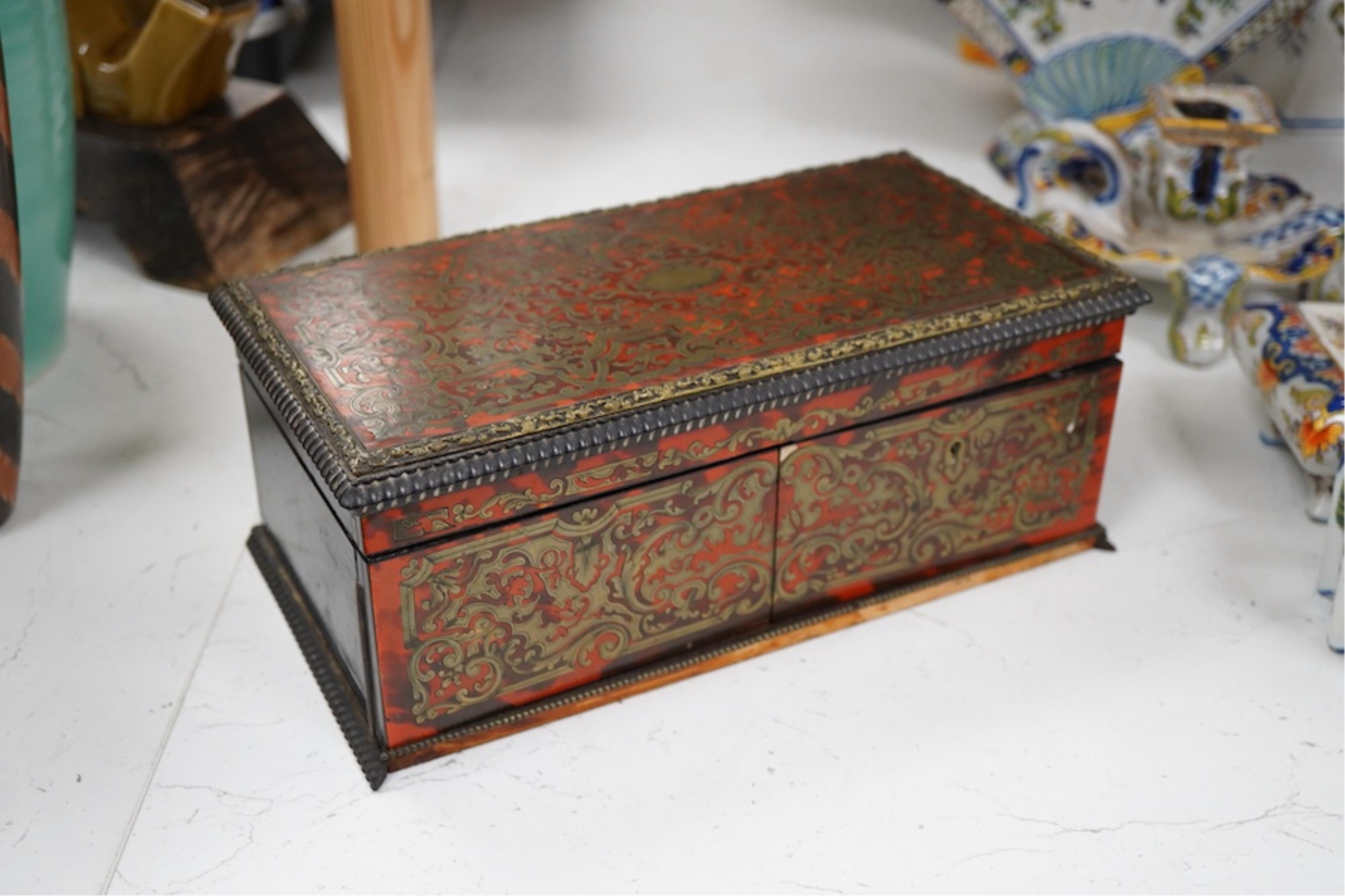 A 19th century French boullework glove box, signed Tahan, Rue de la Paix, width 27cm.